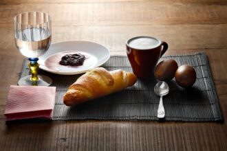 Breakfast is set with food and drink.