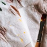 black and brown makeup brush on white tissue paper